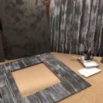 Cropped pieces of the painted 2016 Halloween door on the floor